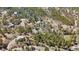 Expansive aerial view of homes and tree-covered landscape from above at 11798 Ridge Rd, Golden, CO 80403