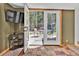 Finished basement with carpet floors and backyard access to the patio and backyard at 11798 Ridge Rd, Golden, CO 80403
