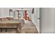 Spacious bedroom with carpet flooring, TV, and French doors to the backyard at 11798 Ridge Rd, Golden, CO 80403