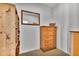 View of closet featuring a wooden dresser with mirror and wooden shelving unit at 11798 Ridge Rd, Golden, CO 80403