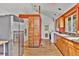 Kitchen features stainless refrigerator, a washing machine, and a large window at 11798 Ridge Rd, Golden, CO 80403