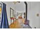 Inviting living room with hardwood floors, wood stove, and natural light at 11798 Ridge Rd, Golden, CO 80403