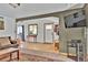 Comfortable living room featuring hardwood floors, a large area rug, and an open layout at 11798 Ridge Rd, Golden, CO 80403
