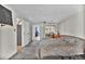 Comfortable main bedroom with plush carpet, closet, and a view of the outdoor greenery at 11798 Ridge Rd, Golden, CO 80403