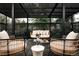Charming backyard deck with a pergola, cozy seating, and a stylish outdoor space at 11673 W 28Th Ave, Lakewood, CO 80215