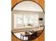 Cozy living room showcasing a bay window seating area and comfortable furnishings at 11673 W 28Th Ave, Lakewood, CO 80215