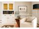Charming living space featuring a built-in cabinet and stylish accents at 11673 W 28Th Ave, Lakewood, CO 80215