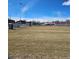 Community baseball field with well-maintained grounds, fencing, and lighting for recreational use at 4661 S Decatur St # 109, Englewood, CO 80110