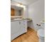 Well-lit bathroom featuring a vanity with ample counter space at 4661 S Decatur St # 109, Englewood, CO 80110