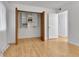 Bedroom closet with built-in shelving provides efficient storage and organization solutions at 4661 S Decatur St # 109, Englewood, CO 80110
