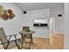 Eat-in dining area open to the kitchen, featuring a breakfast bar and modern lighting at 4661 S Decatur St # 109, Englewood, CO 80110