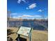 Scenic water view with information sign about underwater life and lake background at 4661 S Decatur St # 109, Englewood, CO 80110