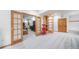 Finished basement with home theater, bonus room, and charming french doors with a vintage popcorn machine at 5846 S Pike Dr, Larkspur, CO 80118
