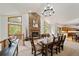 Dining room with vaulted ceilings and a stone fireplace at 5846 S Pike Dr, Larkspur, CO 80118