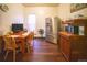 Traditional kitchen with wood flooring and a stainless steel refrigerator at 3732 N Franklin St, Denver, CO 80205