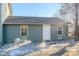 Ranch style home with a white door and rock landscaping at 2131 Coronado Pkwy # A, Denver, CO 80229