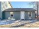 Ranch style home with gray exterior, landscaping, and a walkway at 2131 Coronado Pkwy # A, Denver, CO 80229