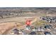 Aerial view of a home located in a Primary-planned community that offers easy access to outdoor recreation at 17851 Herrera Dr, Parker, CO 80134