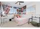 Bright bedroom featuring two windows, neutral carpet, and an eclectic design is great for and teenagers at 17851 Herrera Dr, Parker, CO 80134