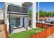 Backyard with patio, grill, and fenced yard at 1299 Newton St, Denver, CO 80204