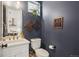 Stylish powder room with elegant fixtures and modern decor at 1299 Newton St, Denver, CO 80204
