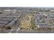 Aerial view of homes next to a community park that has walking paths, picnic areas, and play areas at 10204 Ridgegate Cir, Lone Tree, CO 80124
