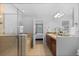 Bathroom showcasing a soaking tub, a glass shower and a dual sink vanity at 10204 Ridgegate Cir, Lone Tree, CO 80124