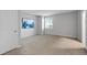 Neutral bedroom with a window and a large blank canvas wall at 10204 Ridgegate Cir, Lone Tree, CO 80124