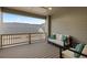 Cozy patio with comfortable seating and a view of the neighborhood rooftops at 10204 Ridgegate Cir, Lone Tree, CO 80124