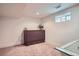 Finished basement featuring a murphy bed and a window allowing natural light at 2039 S Corona St, Denver, CO 80210