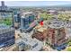Urban area featuring skyscrapers and a red arrow pointing towards the building at 2100 16Th St # 204, Denver, CO 80202