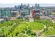 Beautiful high-angle view of the property in the city with a green park space in the foreground at 2100 16Th St # 204, Denver, CO 80202