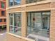 Balcony with view into bedroom and the skyline beyond at 2100 16Th St # 204, Denver, CO 80202