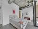Bedroom featuring modern ceiling, industrial ductwork and white walls at 2100 16Th St # 204, Denver, CO 80202