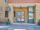 Building entrance with glass doors and '2100 Sixteenth Street' sign at 2100 16Th St # 204, Denver, CO 80202