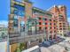 View of mixed-use buildings with private balconies offering urban living and dining at 2100 16Th St # 204, Denver, CO 80202