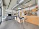 Open-concept living space featuring modern kitchen, dining area, and comfortable living room at 2100 16Th St # 204, Denver, CO 80202