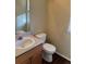 Small bathroom with a toilet and sink at 560 Hampstead Ave, Castle Rock, CO 80104