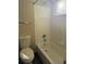 Clean bathroom with a tub, shower, toilet, and window at 560 Hampstead Ave, Castle Rock, CO 80104