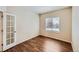 Office features wood floors, a bright window, and neutral paint at 560 Hampstead Ave, Castle Rock, CO 80104