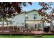 Exterior view of the home showcases the deck and backyard at 4707 N Bearlily Way, Castle Rock, CO 80109