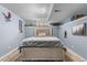Basement bedroom featuring a bed and wall decor at 4707 N Bearlily Way, Castle Rock, CO 80109
