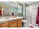 Bathroom featuring a shower, tile floor, a window and a single sink at 4707 N Bearlily Way, Castle Rock, CO 80109