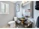Modern bathroom featuring a vessel sink, vanity and tile flooring at 4707 N Bearlily Way, Castle Rock, CO 80109