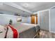 Cozy bedroom features blue walls, wood-look floors, and natural light at 4707 N Bearlily Way, Castle Rock, CO 80109