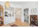 Bright interior shot showcases the open floor plan and a glimpse into the laundry area at 180 Cook St # 406, Denver, CO 80206