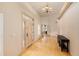 Bright foyer features hardwood floors and natural light from the front door at 3231 Oak St, Wheat Ridge, CO 80033