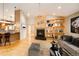 Spacious living room features vaulted ceilings, a fireplace, and hardwood floors at 3231 Oak St, Wheat Ridge, CO 80033