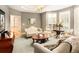 Cozy living room with hardwood floors, traditional seating, and natural light at 3231 Oak St, Wheat Ridge, CO 80033