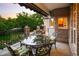 View of the outdoor patio with comfortable seating and a covered awning at 3231 Oak St, Wheat Ridge, CO 80033